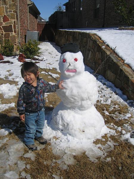 March7Outside 002.jpg - Lukas and snowman - March 7